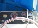 Here's the dash set up that came with the boat...thanks to corrosion the only thing that worked was the tachometer. Part of the console and dash were full of drill holes that it looked like swiss cheese from prior installation of large, bulky 80's vintage electronics.