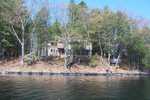 This summer cottage is on it's own island. There are five islands on this lake.