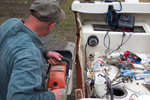 My bother, the chainsaw/boat repairman