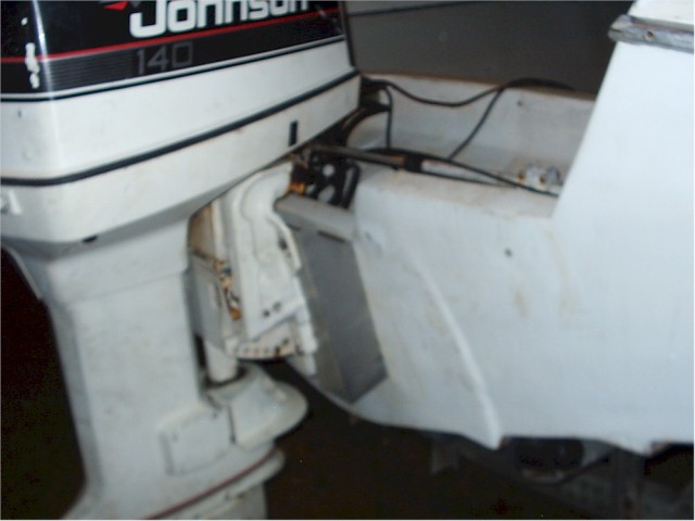 A picture of the new jack plate.  Boat is dirty. 