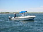 here's the boat after some major work.  got rid of the OMC sea drive and added A bracket from "stainless marine" with a new yamaha 200 hp