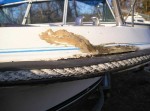(1) When I first saw the boat, this badly repaired "dock bang" seemed the worst thing as far as fiberglass damage.  But once I got the rubrail off it was an entirely different story.