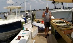 Mahi and cleaning table.jpg
