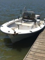 wellcraft 17 tied to dock with night lights.jpg