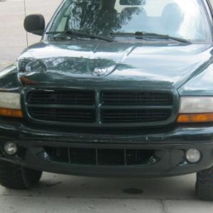 an 1999 Dodge Durango from Maine (rust) to pull it, front end damage, no heat and ac, two windows not working, rear hatch wont stay up and in need of 