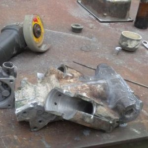rebuilding the power tilt and trim which results in a new manifold