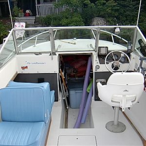 simple interior, lounge seats, open cutty