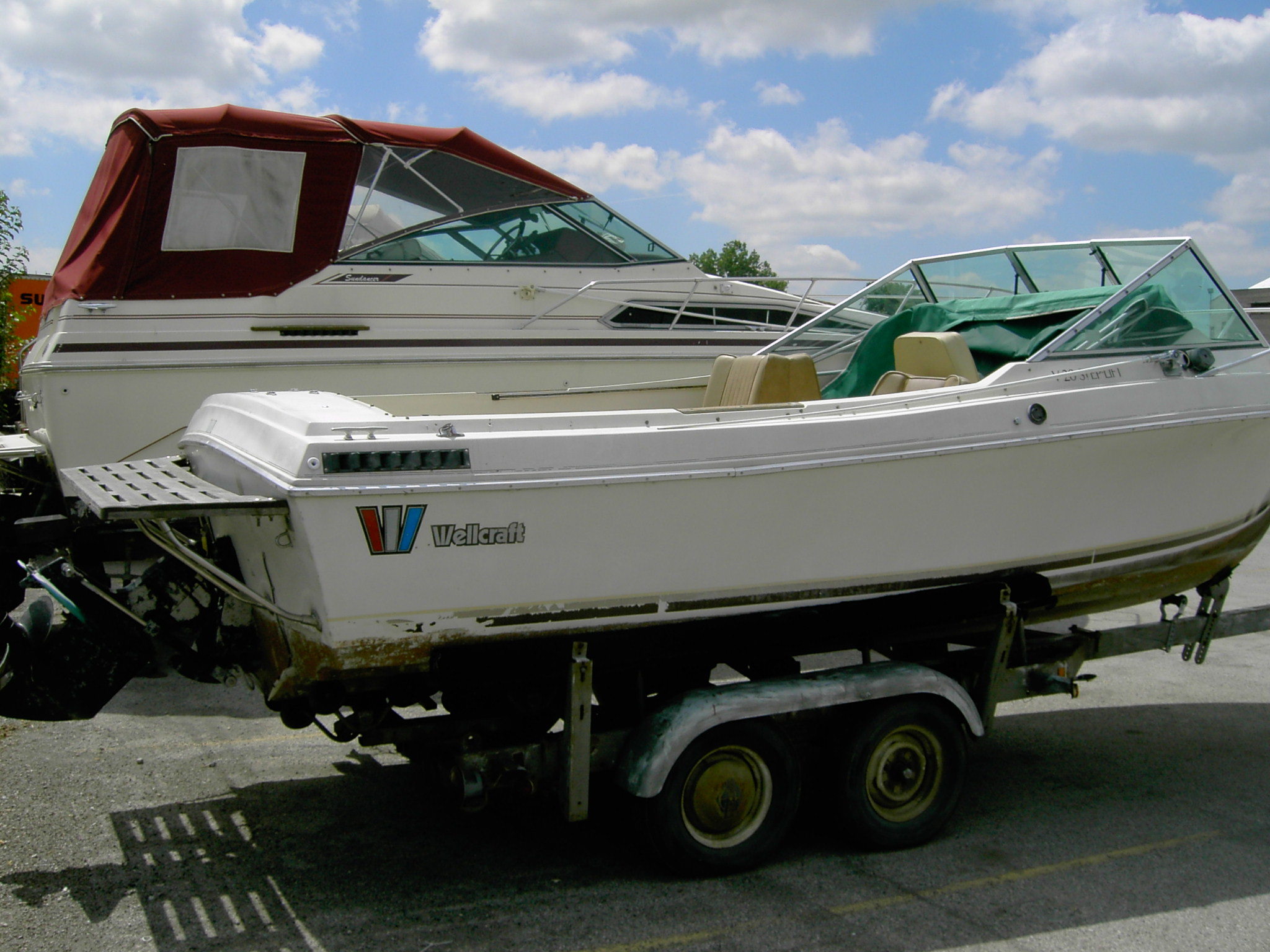 Before - Rear Starboard. I hate the old brown bottom paint. Still have the platform. It's refinished, and waiting for next year.