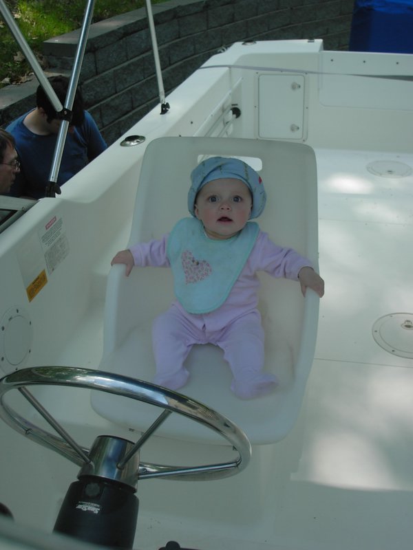 Here is Lana Rose at the helm of the "Lana Rose". That's right, I named the boat after my daughter.