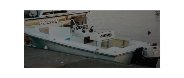 I purchsed her (Ebay) and used her the first season (09/05). 
Note-The gunnel rod boxes were in peices. I taped them from behind and sprayed the front