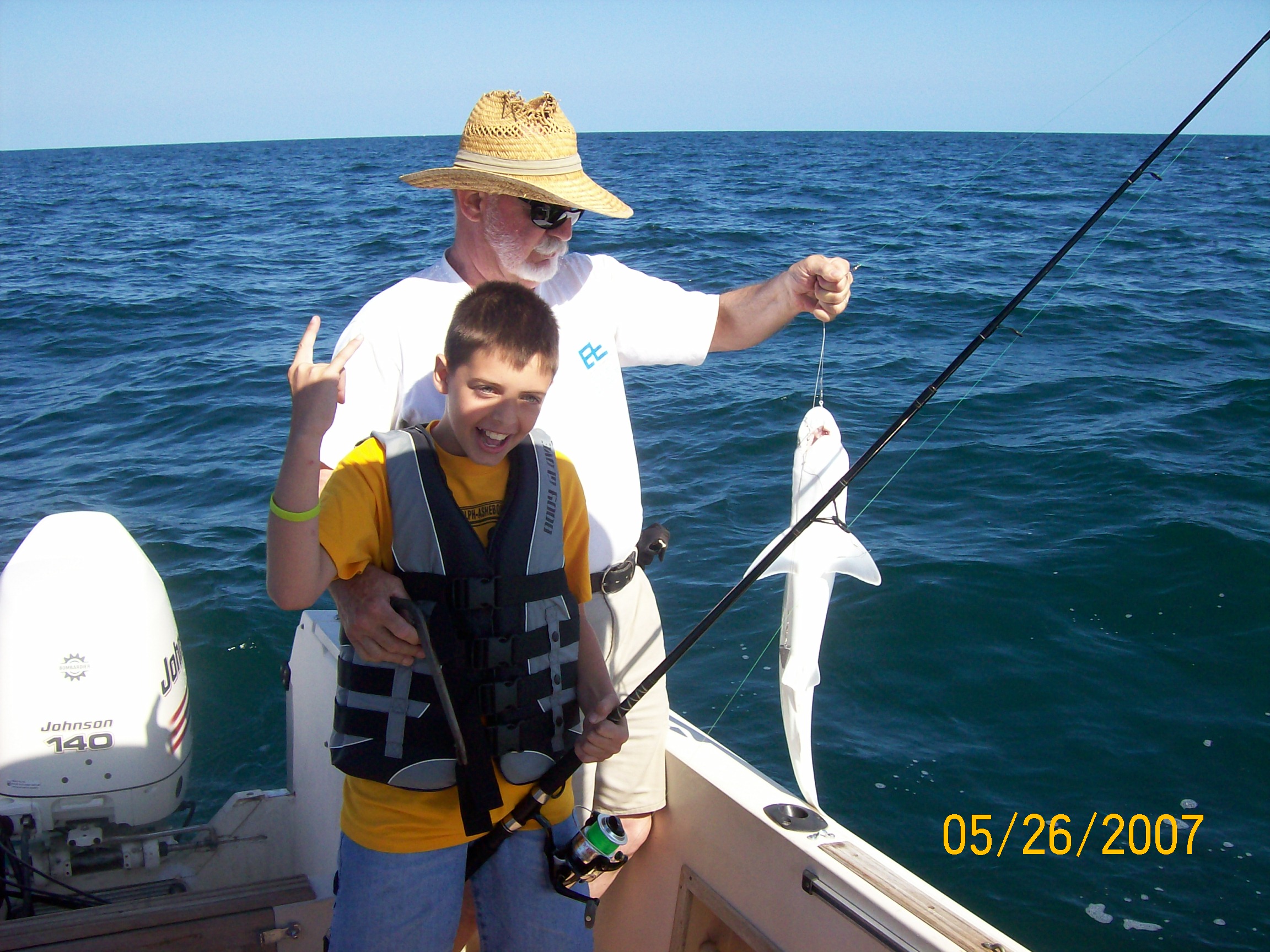 Pawpaw and Joey with a sand shark.