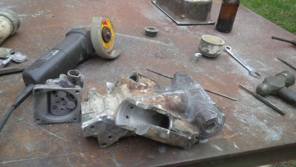 rebuilding the power tilt and trim which results in a new manifold