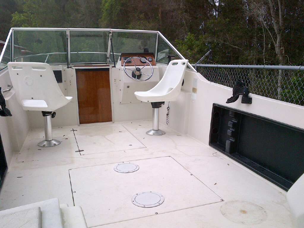 Rod holders reglassed, painted, and Cherry coming onboard.