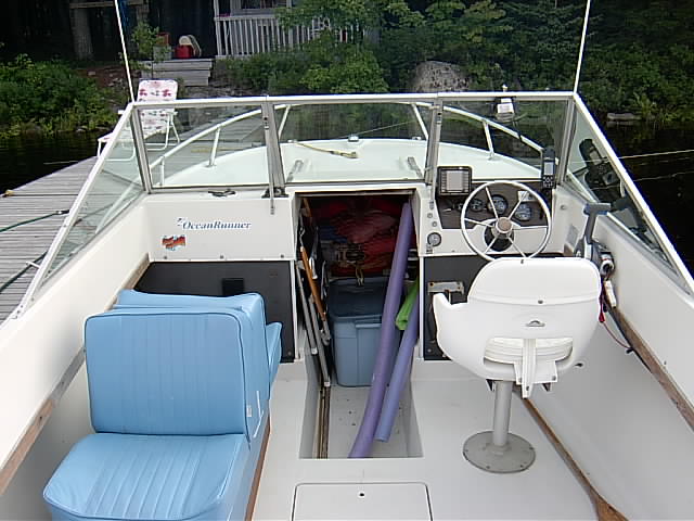 simple interior, lounge seats, open cutty