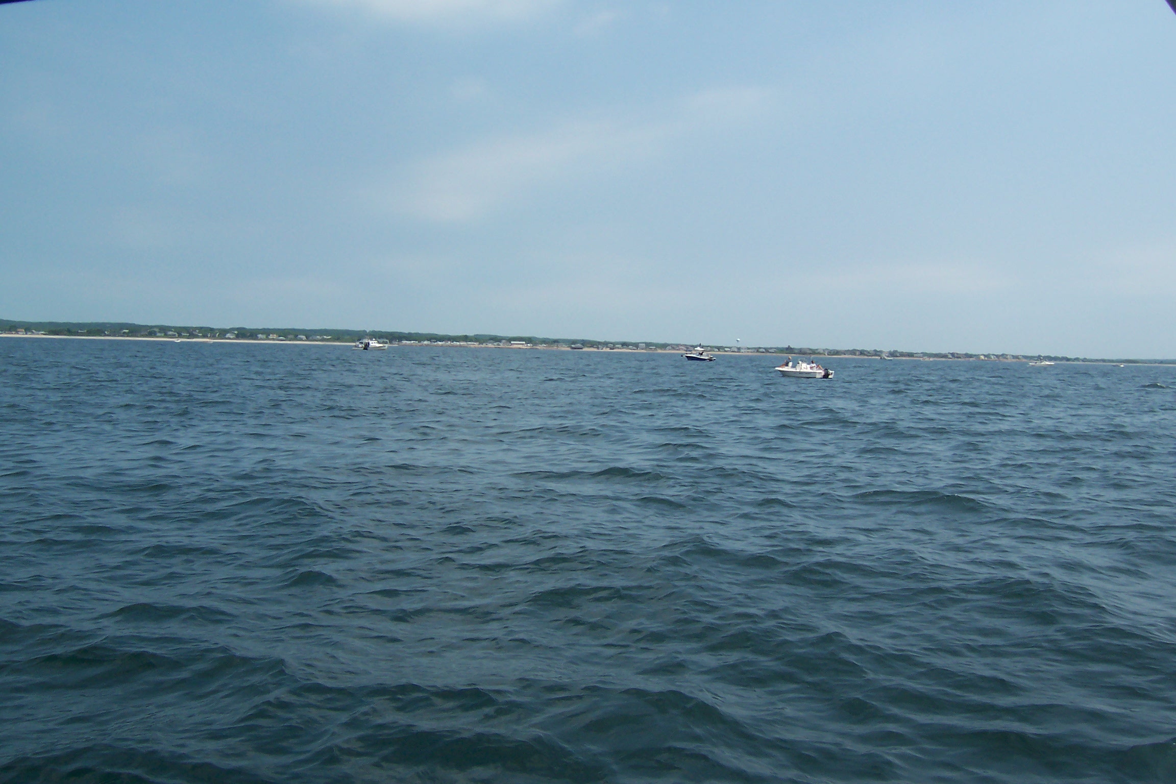 Some boats starting fishing in closer to the shoreline